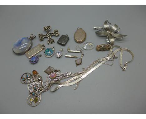 A large silver set quartz pendant, two silver opal set pendants, an owl brooch, a silver locket, Birmingham 1900, a/f, one ot