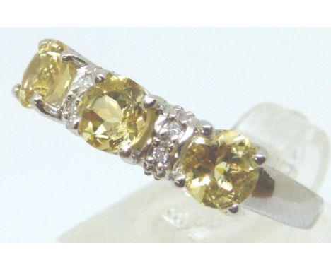 New old stock sterling silver golden beryl and diamond ring with certificate, size P