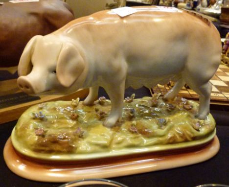 Continental pig on a ceramic base 
