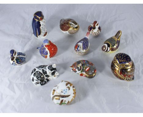 SECTION 36.  Eleven assorted Royal Crown Derby ceramic paperweights modelled as birds and a cat etc. 
