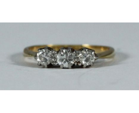 An 18ct yellow gold three-stone diamond ring, estimated total diamond weight 0.40 Carats, 2.10 grams 