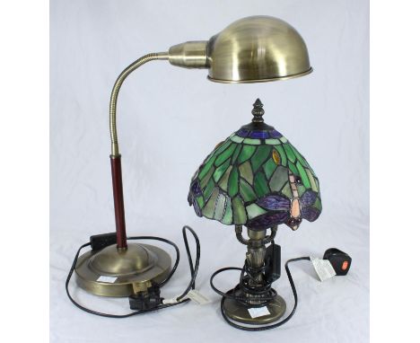 A small Tiffany style table lamp with stained glass effect shade, together with antique brass effect desk lamp, with articula