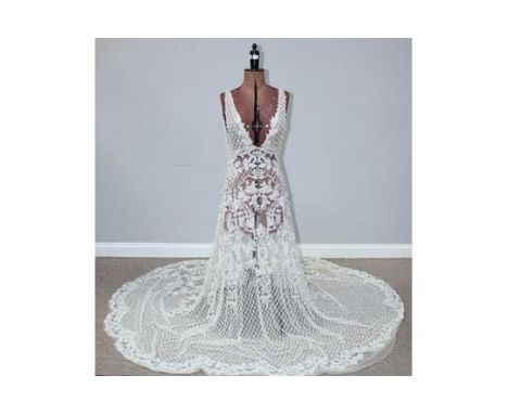 An unworn hand-stitched heavily beaded, pearled and diamante sheer 1930s style wedding dress, backless, approx. size 12/14, 1