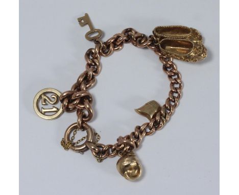 A 9ct gold curb-link Albert chain charm bracelet, 29.04g 
