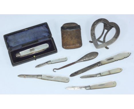 Six silver folding penknives with MOP handles (one in fitted box), together with a button hook, heart-shaped photograph frame