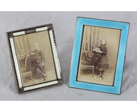 A Mappin &amp; Webb silver and blue guilloche enamel rectangular easel photograph frame, 12cm high, and another 'Stirling' re