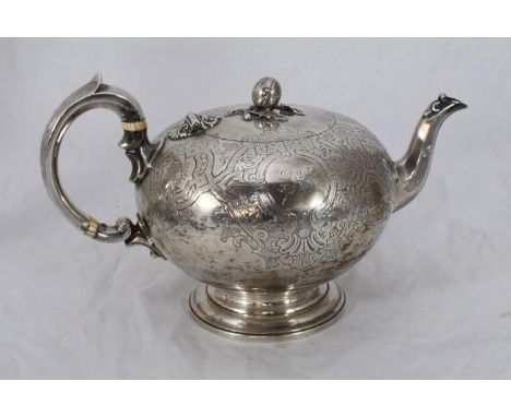 A Victorian silver teapot of compressed globular form by Edward &amp; John Barnard, the lid with pomegranate and leaf pattern