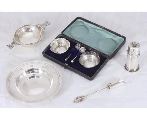 A Victorian silver pepper caster together with a cased pair of silver open salts and spoons, silver Quaich with Celtic-cast h