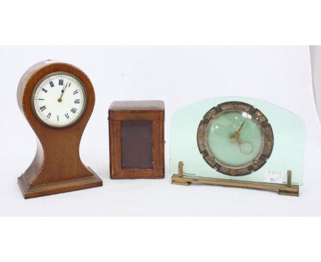 An Edwardian walnut-cased balloon clock, 22cm high, together a Smiths glass and enamel clock and a leather carriage clock cas
