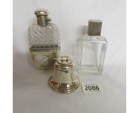 A silver bell inkwell, a silver topped perfume bottle and a Victorian silver plate hip flask (a/f nick).