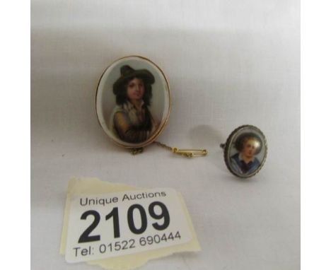 A porcelain brooch depicting a portrait of a 17/18th century boy in a 9ct gold mount together with a silver ring depicting a 