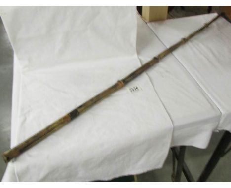 A cane sword stick with collar stamped Louis.