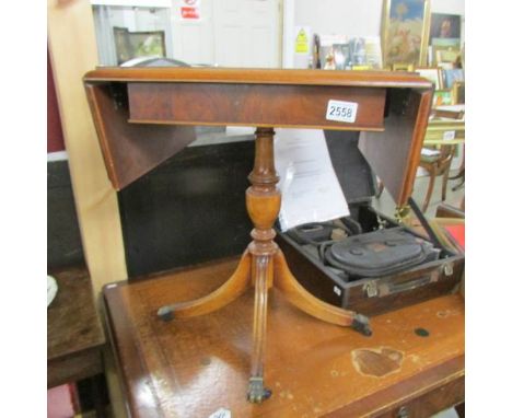 A small mahogany drop side table.