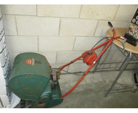 A Suffolk Super Colt petrol engine lawn mower