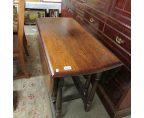 An oak gate leg table.