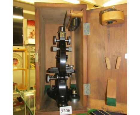 A cased microscope.