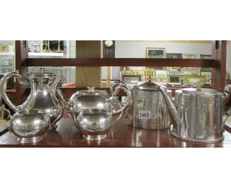 A Walker and Hall 4 piece silver plate teaset together with 2 teapots.