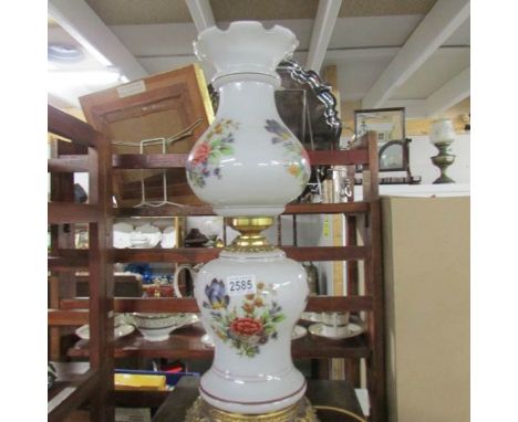 A floral decorated table lamp.