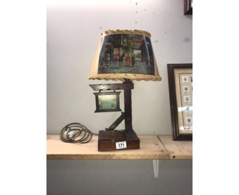 An unusual music box/lamp with hunting theme shade
