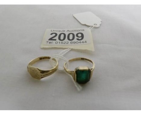 A 9ct gold ring set green stone, size K and a 9ct gold signet ring, size M.