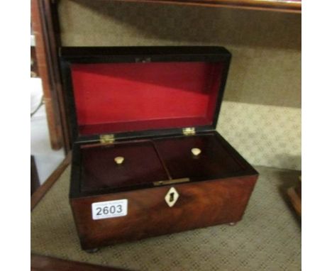 A Victorian mahogany tea caddy,.