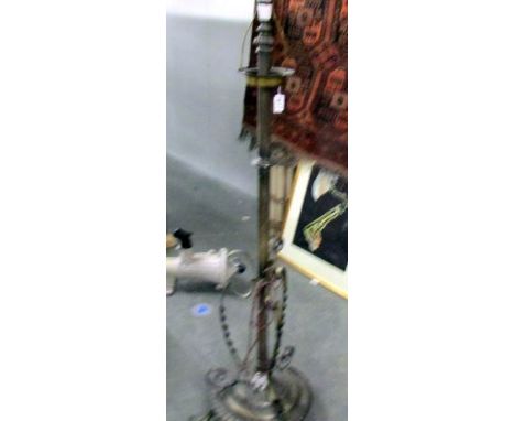 A brass standard lamp.
