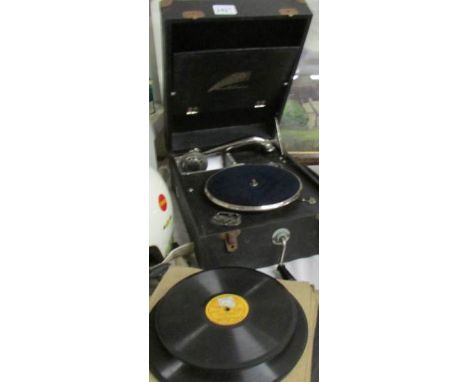 A Decca picnic gramaphone with records.