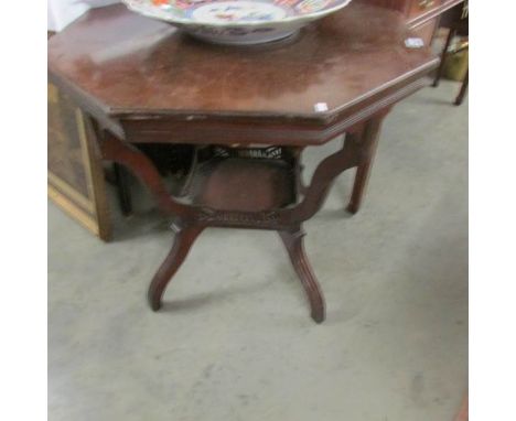 A mahogany octagonal occasional table.