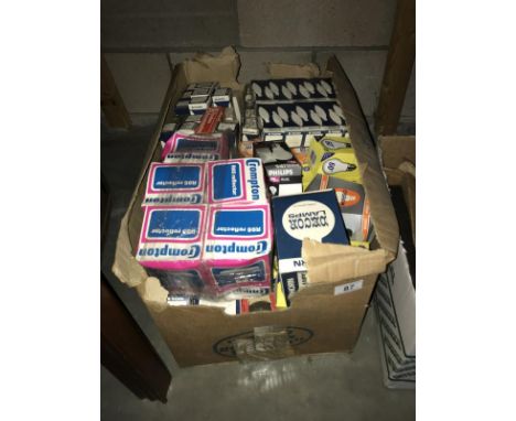 A box of mixed light bulbs