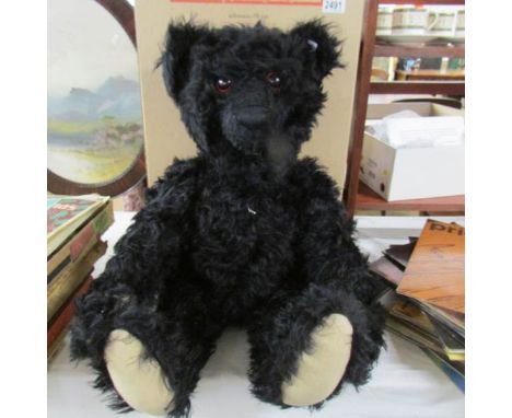 A 2003 Steiff Replica Titanic/Mourning growler black bear (approximately 27"/68 cm) with box and certificate.