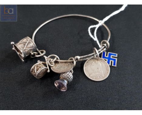 ANTIQUE SILVER CHARM BRACELET TO INCLUDE SILVER AND ENAMEL SWASTIKA 