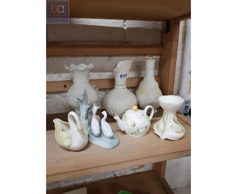 SHELF LOT OF BELLEEK AND NAO FIGURE 