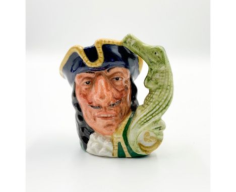 Style one jug with a crocodile and clock handle.Captain Hook is the nemesis of Peter Pan in J.M. Barrie's famous story. The m