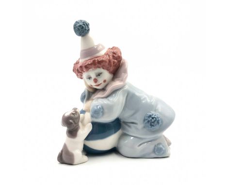 Clown playing with a dog and ball - Lladro number 01005278.PIERROT CON EL PERRITO Y LA PELOTA. Artist: Jose PucheIssued: 1985
