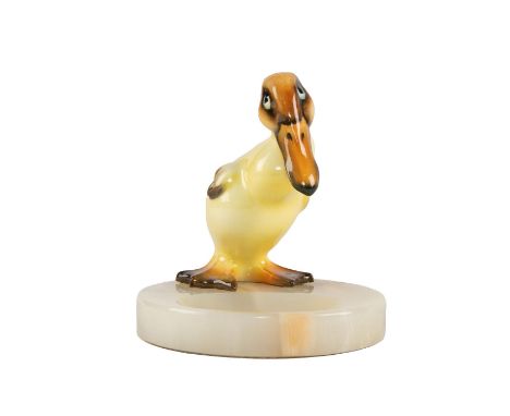 Character Duck, model 415, on a carved agatized marble tray base.Yellow, black, brown colorway. Issued: 1924-1946Dimensions: 