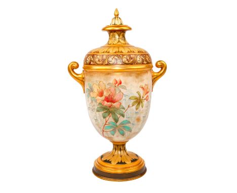 Handled, gilded; decorated with enamel forals and raised slip.Marked on bottom DOULTON BURSLEM in crowned rosette, J.L. CALDW
