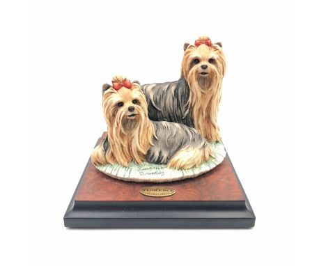 Yorkie dogs sculptured and marked Original Giuseppe Armani to underside.Also signed to base of figure. Two Yorkies made in ce