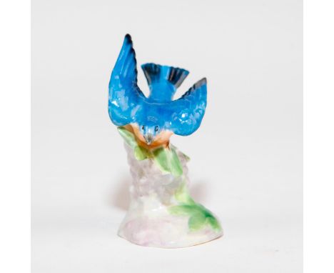 Style One, Model 1129. Blue, pink, green colorway.Issued: c. 1940Dimensions: 2.5"H x 1.25"LManufacturer: Royal DoultonCountry
