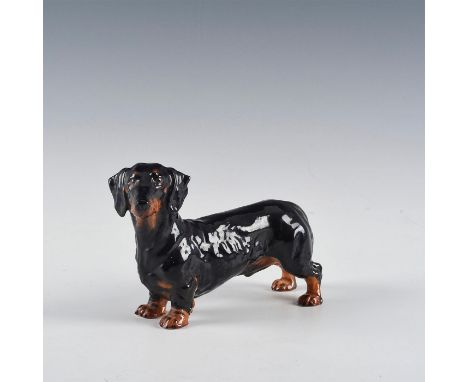 IconicÂ&nbsp;Doulton Dog, Dachshund HN1128 Medium, designed by Frederick Daws.Dark/light brown. Marked on bottom. Artist: Fre