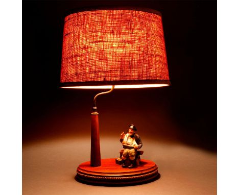 Presented on a custom oval wooden base modeled with rope and a stylized wooden ship's mast for the electrical fixture.A Royal