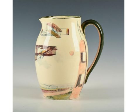 A rare hand decorated creamware pitcher with green trim to rim and handle.A rare hand decorated creamware pitcher with green 