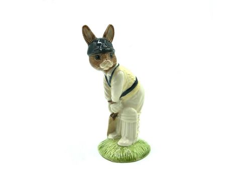 Bunny playing Cricket.Hand painted white, yellow and black. Artist: Denise Andrews and Amanda Hughes-LubeckIssued: 1994Dimens