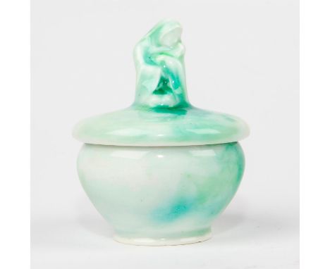 Lidded piece in rarely used glaze, hand inscribed on bottom.A unique piece for any Doulton collector, MOTHERHOOD is given a r