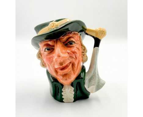 Green coat and hat with cane and handkerchief handle.The Regency Beau character jug represents the styles and aesthetics asso