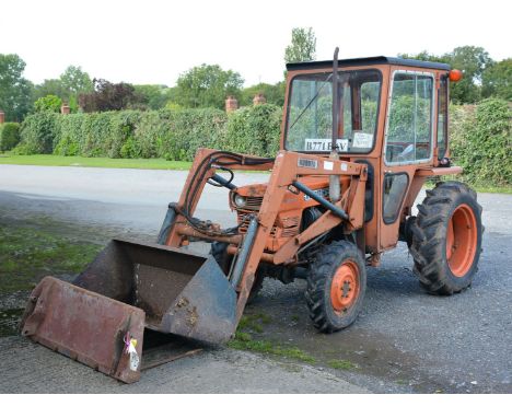 A Kubota L245 DT Diesel engined Four Wheel Drive compact farm Tractor B771 BAV with cab (all glass intact) and fore-end Loade