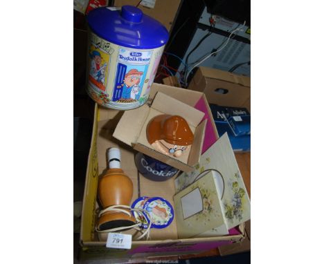 A table lamp, Tetley tea Cookie jar and a biscuit tin,