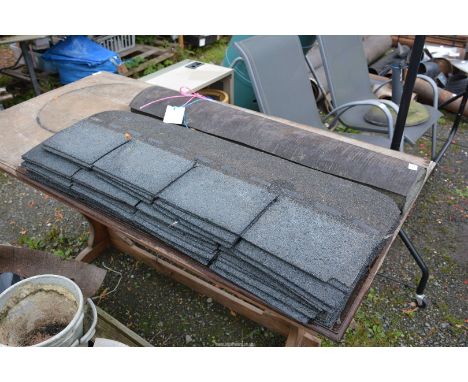 One roll of Roofing Felt plus 22 Felt Tile lengths (four tiles per length).