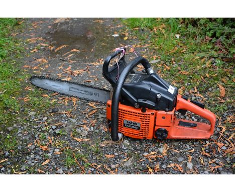 A Dolmar Chainsaw, (chain brake not working, good compression), 15" cutter bar.