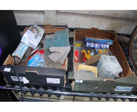 Two trays of various tools including welding rods, staples, nails, Workzone table vice.