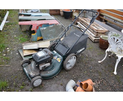 A "Craftsman" self propelled Mower, with Briggs & Stratton easy start engine, good compression.